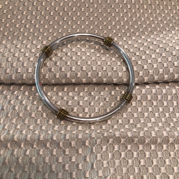 Jewelry - sterling silver bangle bracelet with gold accents Jewelry - sterling silver bangle bracelet with gold accents